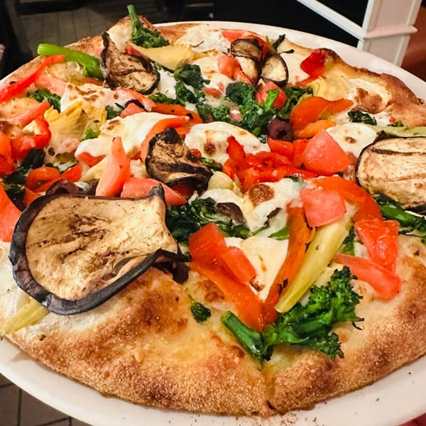 Luna Rossa's vegetarian pizza with grilled eggplant, red peppers, broccoli rabe, and melted cheese.