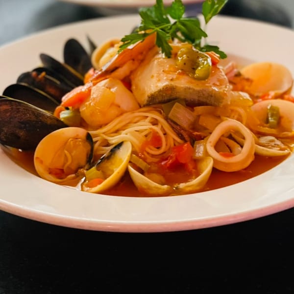 Luna Rossa's seafood pasta with mussels, clams, shrimp, calamari, and fish in a rich tomato sauce.